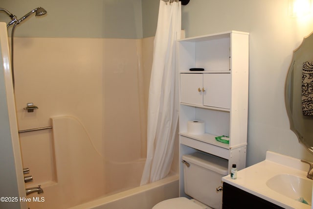 full bathroom with vanity, toilet, and shower / tub combo