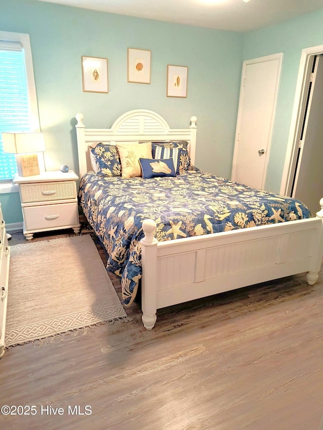 bedroom featuring hardwood / wood-style floors