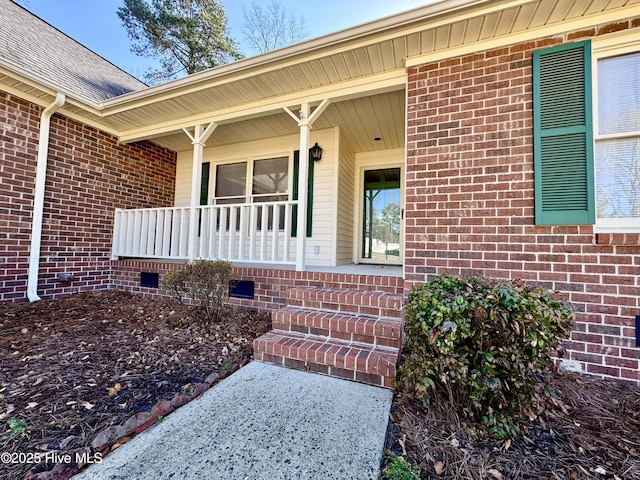 entrance to property with covered porch