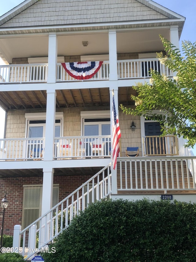2208 Evans St, Morehead City, NC 28557 - view of front of house with a balcony