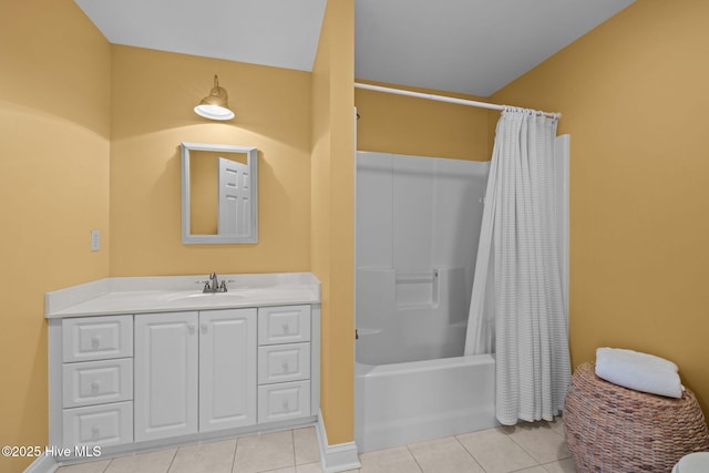 bathroom featuring shower / tub combo with curtain, vanity, and tile patterned flooring