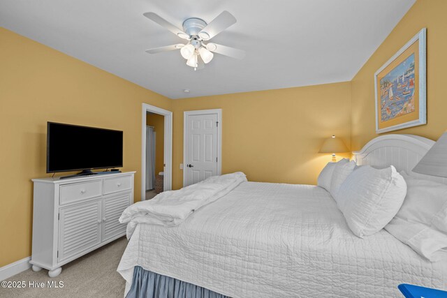 2208 Evans St, Morehead City, NC 28557 - bedroom featuring light colored carpet and a ceiling fan