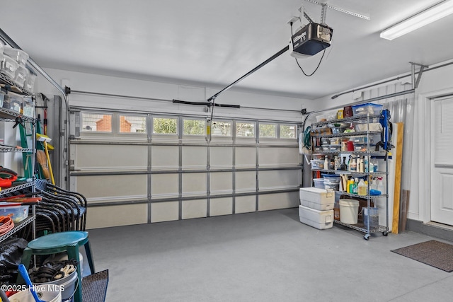 garage featuring a garage door opener