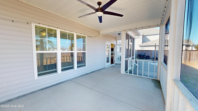 view of patio / terrace featuring ceiling fan