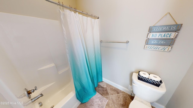 bathroom with shower / tub combo, tile patterned floors, and toilet