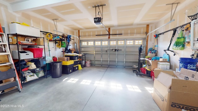 garage featuring a garage door opener