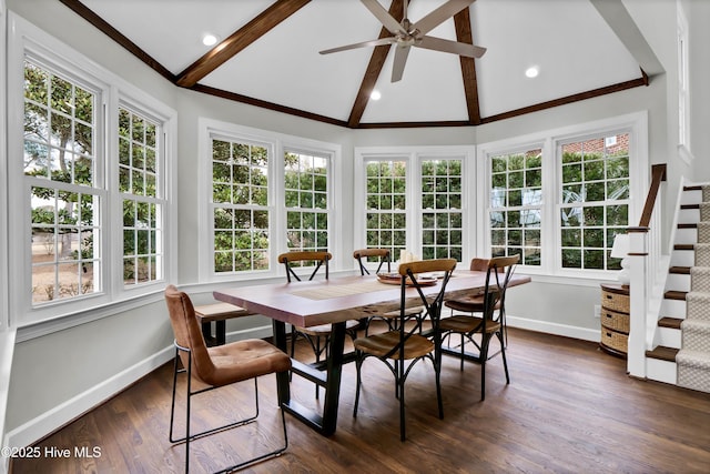 sunroom featuring vaulted ceiling with beams and ceiling fan