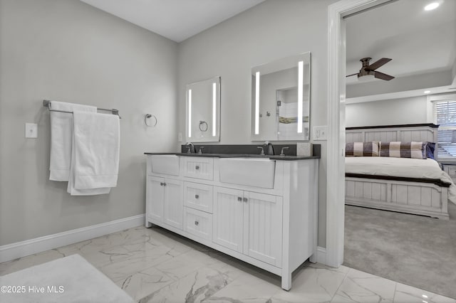 bathroom featuring vanity and ceiling fan