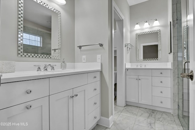 bathroom featuring vanity and tiled shower