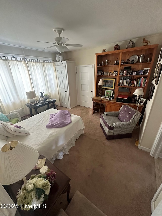 bedroom with carpet and ceiling fan