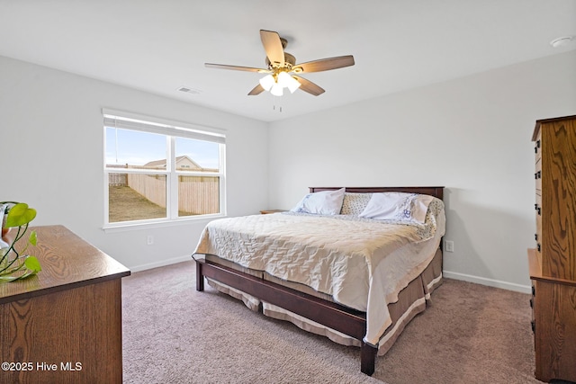 bedroom with ceiling fan and carpet