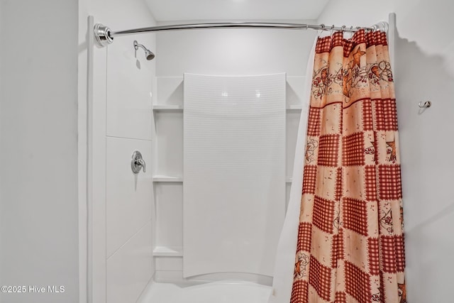 bathroom featuring walk in shower