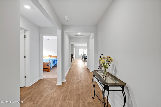 corridor featuring light wood-type flooring