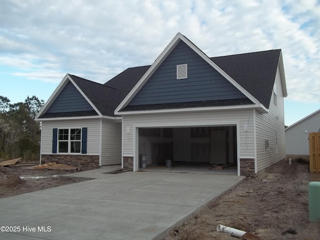 craftsman house with a garage