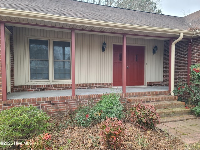 entrance to property with a porch