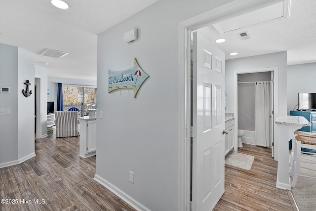 hall featuring light hardwood / wood-style floors