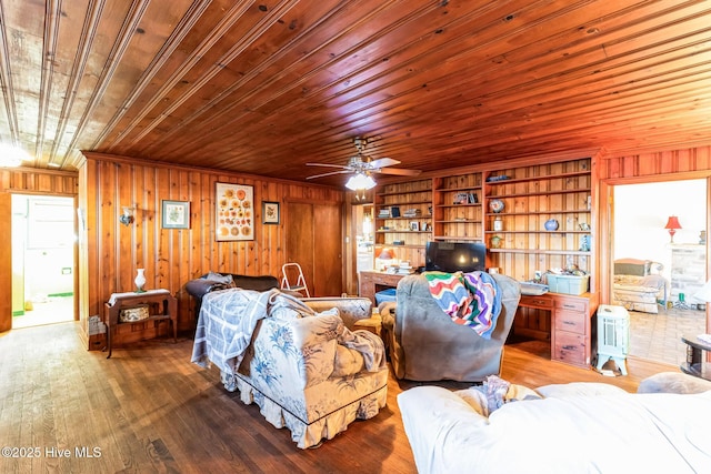 living room with hardwood / wood-style flooring, wooden walls, and wood ceiling