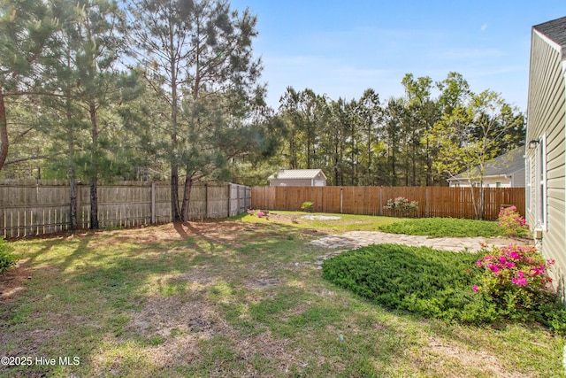 view of yard featuring a fenced backyard