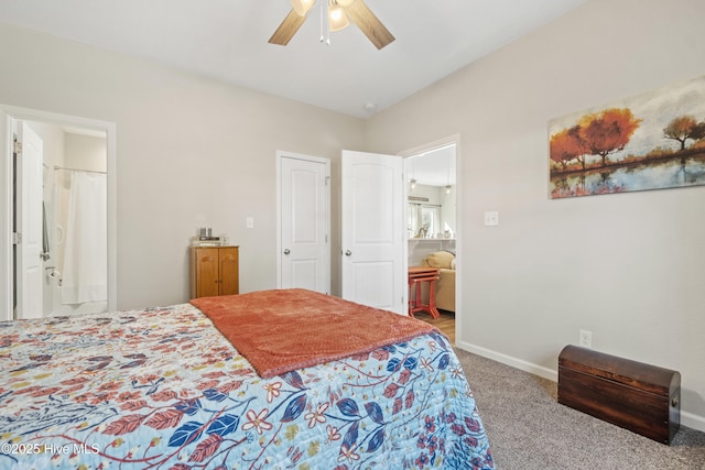 carpeted bedroom featuring ensuite bathroom and ceiling fan