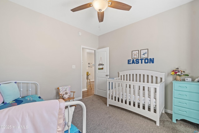 carpeted bedroom featuring ceiling fan