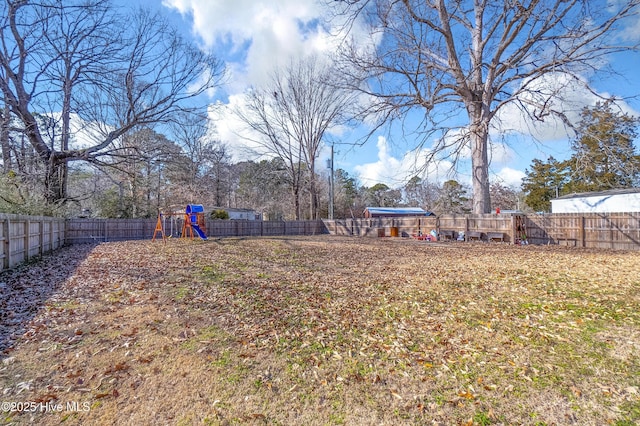 view of yard featuring a playground