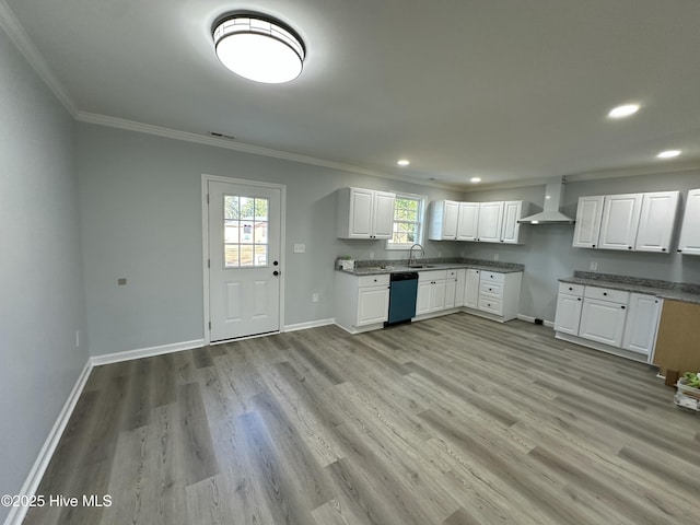 kitchen featuring sink, dishwasher, white cabinetry, wall chimney exhaust hood, and light wood-type flooring