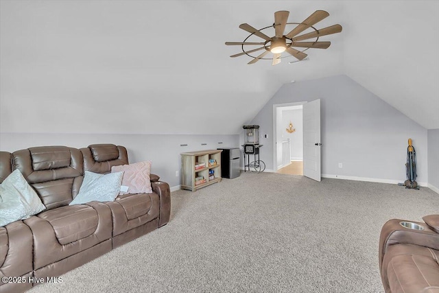 carpeted living room featuring vaulted ceiling and ceiling fan