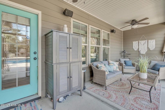 view of patio with french doors and ceiling fan