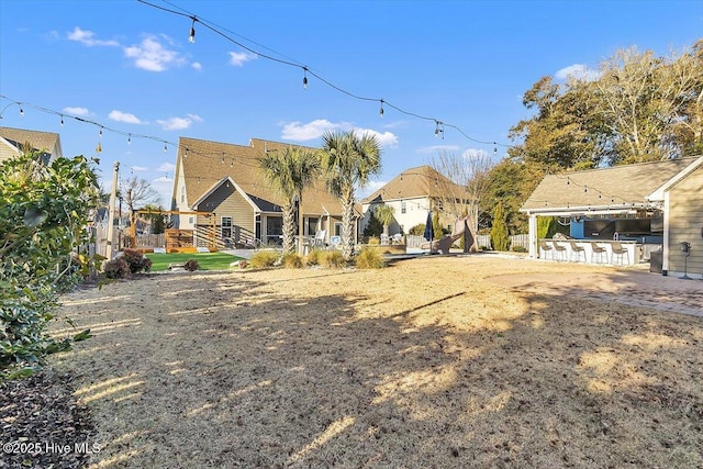 view of yard featuring a bar