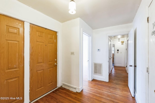 foyer entrance with wood-type flooring