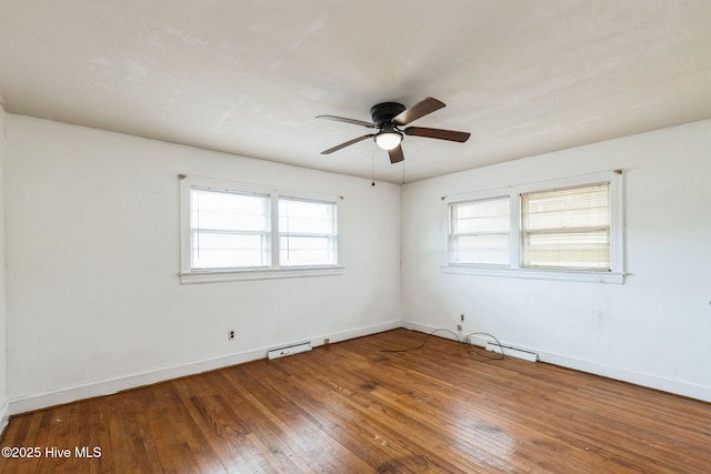 unfurnished room with hardwood / wood-style flooring and ceiling fan