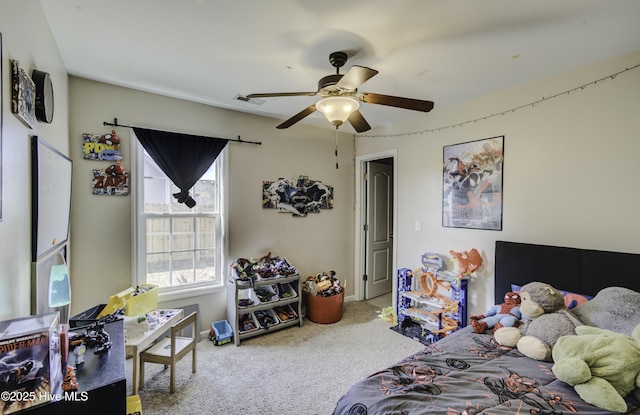 bedroom featuring carpet flooring, visible vents, and a ceiling fan