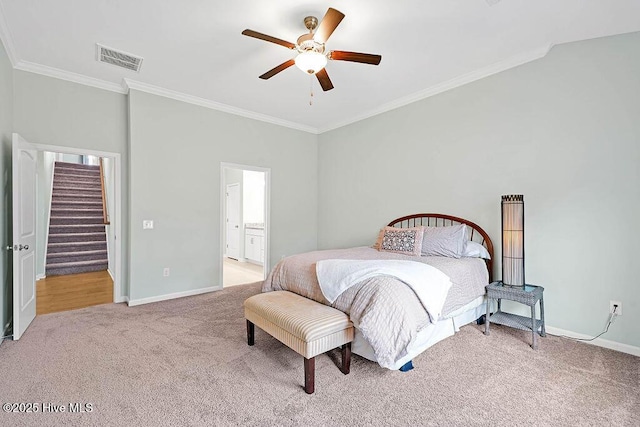 carpeted bedroom featuring crown molding, ceiling fan, and connected bathroom