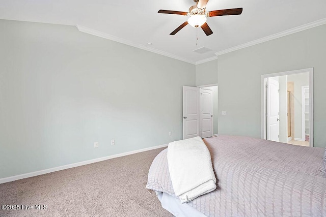 carpeted bedroom with crown molding, ensuite bathroom, and ceiling fan