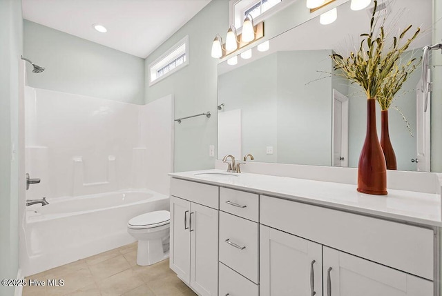 full bathroom with tile patterned flooring, vanity, shower / bathtub combination, and toilet