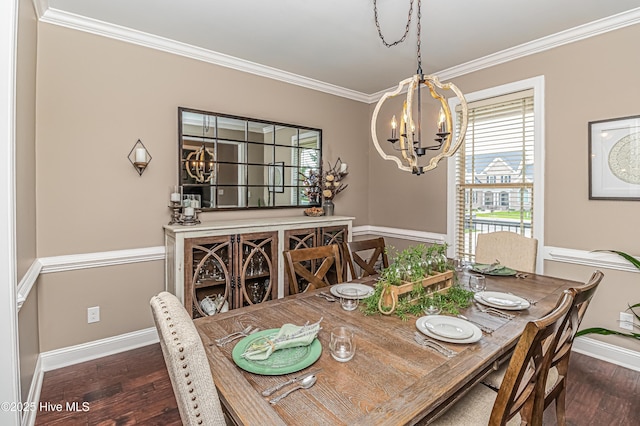 dining space featuring ornamental molding and dark hardwood / wood-style floors