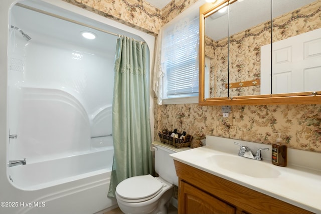 full bathroom with vanity, toilet, and shower / bath combo with shower curtain