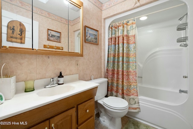 full bathroom featuring shower / bath combination with curtain, vanity, and toilet