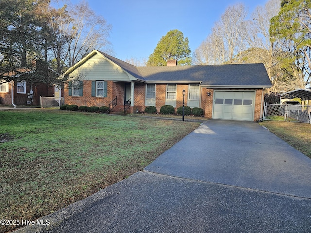 single story home featuring a garage and a front yard