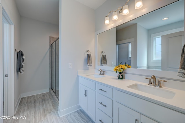 bathroom featuring vanity and walk in shower