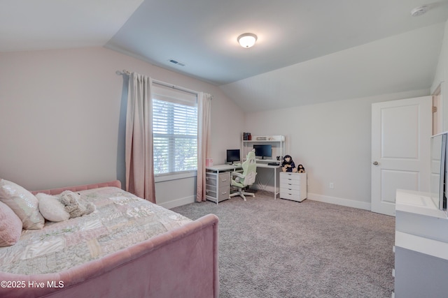 bedroom with lofted ceiling and light carpet