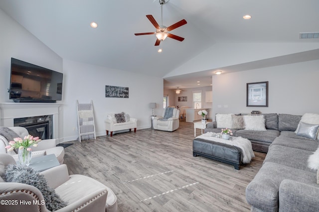 332 Grandview Dr, Hampstead, NC 28443 - living room with visible vents, a fireplace, ceiling fan, wood finished floors, and recessed lighting
