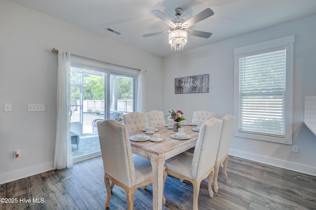332 Grandview Dr, Hampstead, NC 28443 - dining area with baseboards, visible vents, wood finished floors, and a ceiling fan