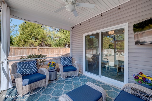 view of patio / terrace featuring ceiling fan