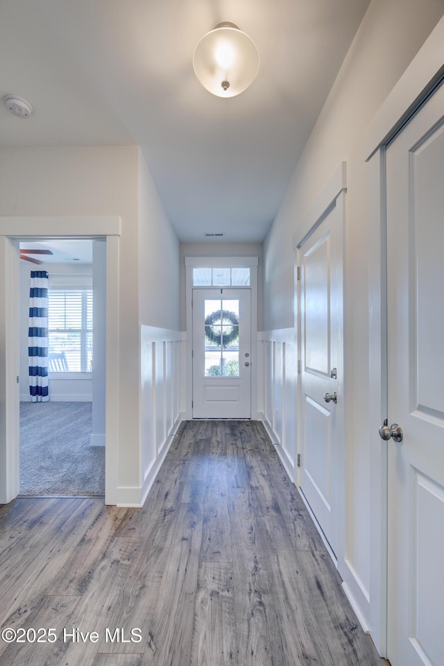 entryway with plenty of natural light and light wood-type flooring