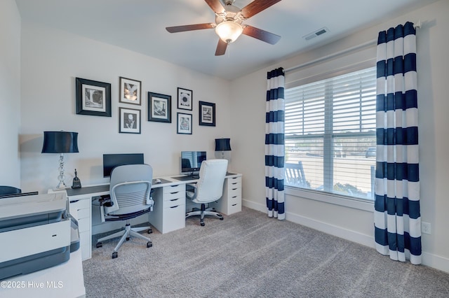 office area featuring light colored carpet and ceiling fan