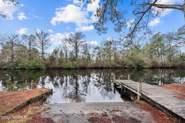 view of dock with a water view