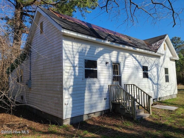 back of property with crawl space