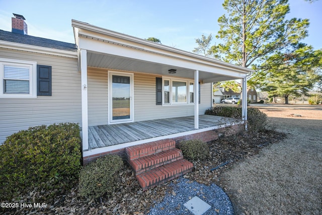 property entrance with a porch