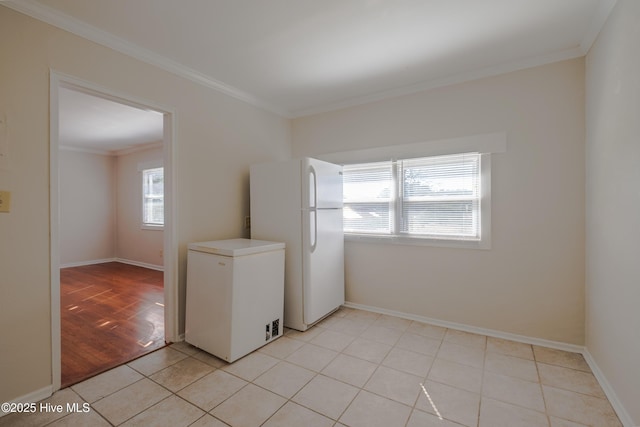 interior space with crown molding